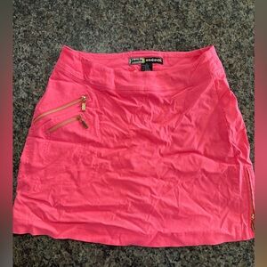 Jamie Sadock golf skorts. 2 used skorts. Hot pink & white. Both are size 6.